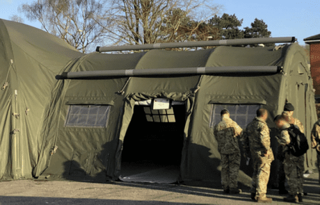 PRO X Command Post made of 4 PRO tents arranged in an X shape around an interconnecting module
